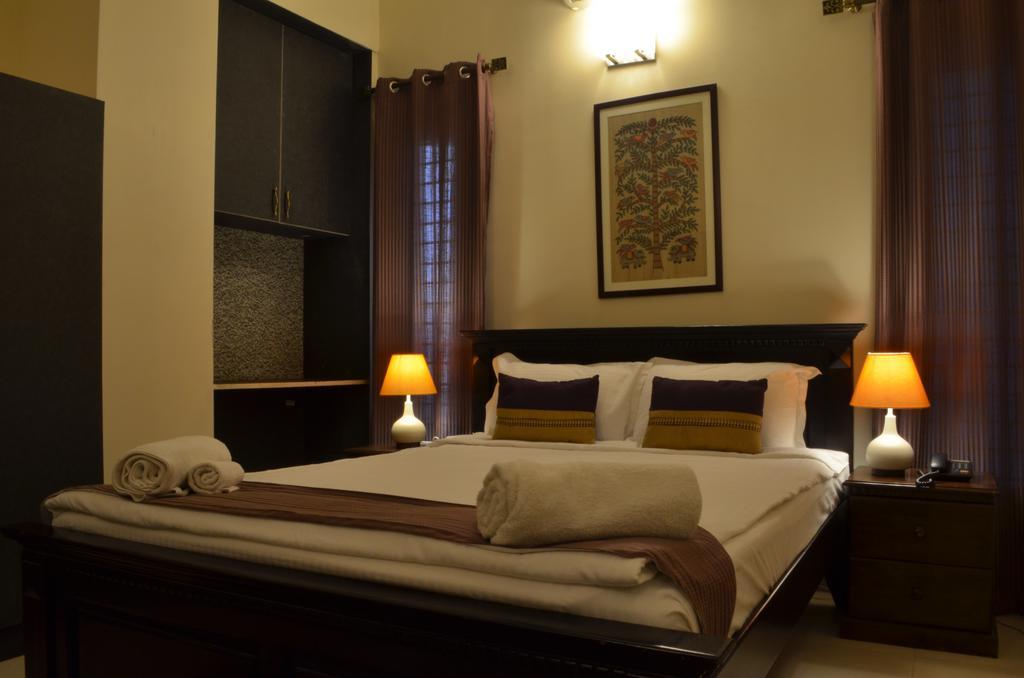 Luxtay Suites Bangalore Rum bild